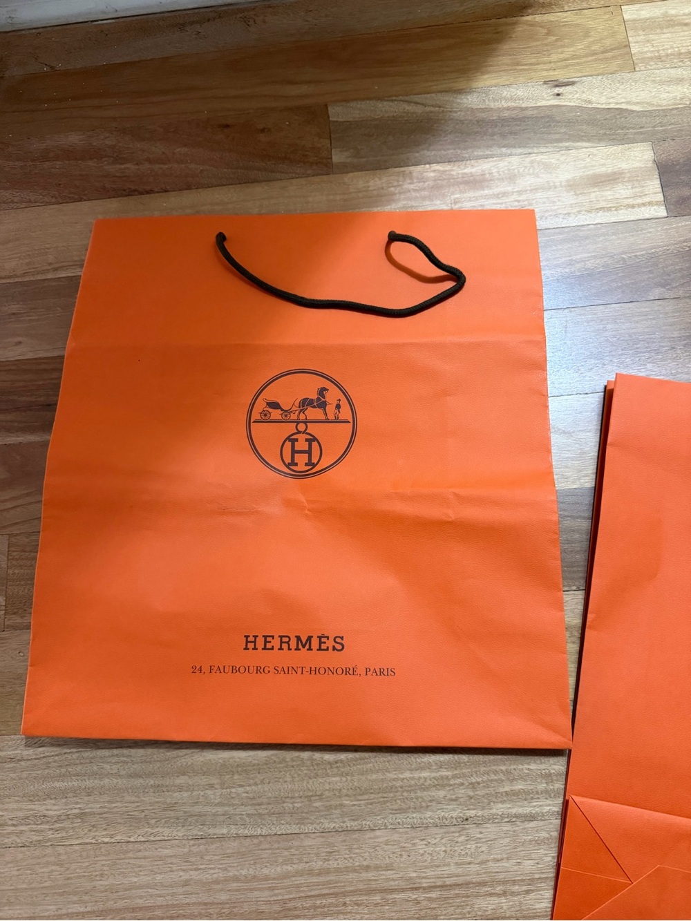 Hermes Orange Shopping Bag with Black Rope Handles